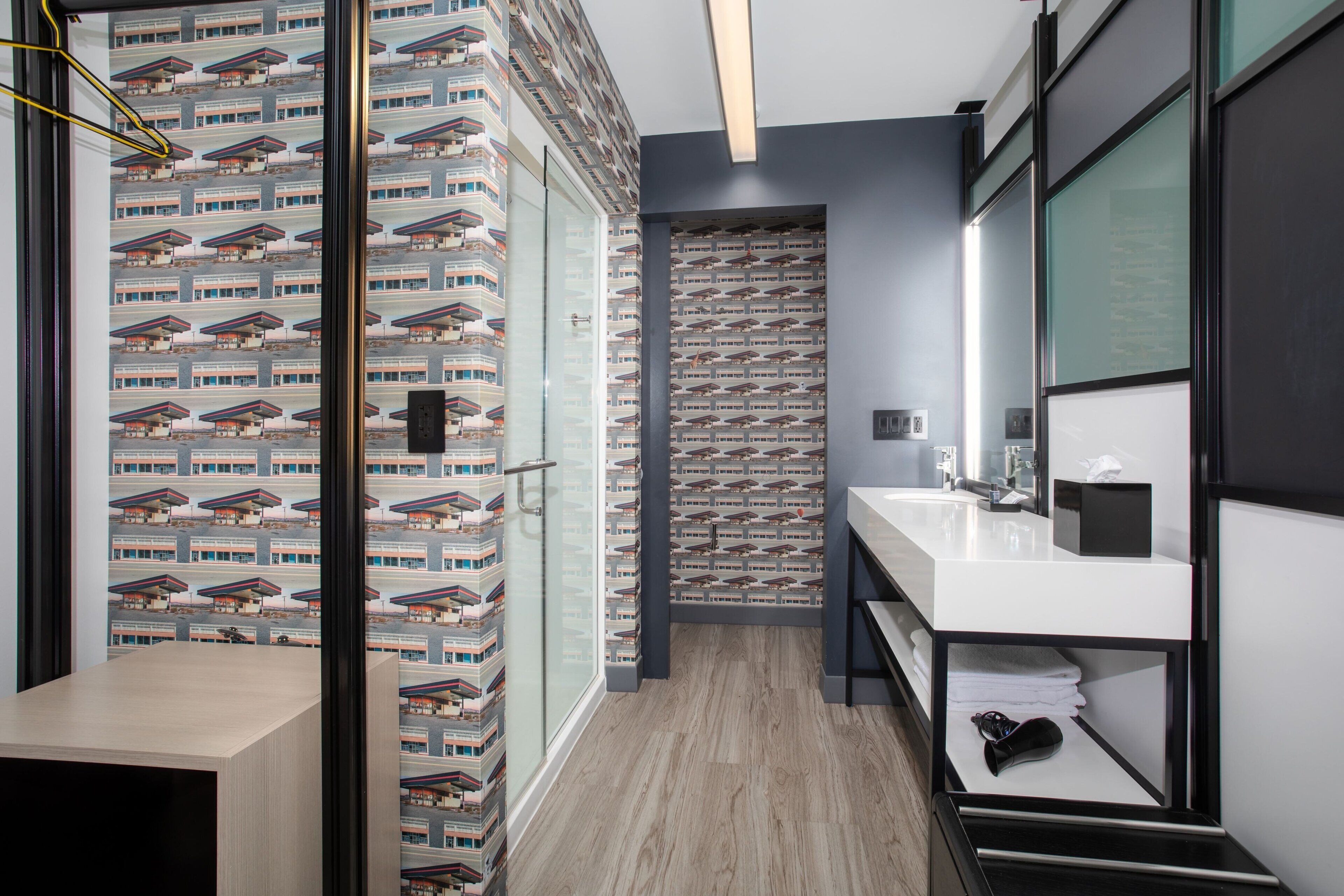 shower, rainfall showerhead, designer toiletries, hair dryer