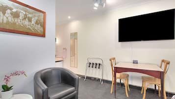 Room, 1 King Bed, Non Smoking (Upgrade) | Iron/ironing board, travel crib, rollaway beds, free WiFi