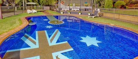 Outdoor pool, open 8:00 AM to 9:00 PM, pool umbrellas, pool loungers