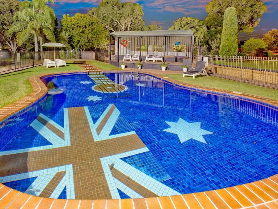 Outdoor pool, open 8:00 AM to 9:00 PM, pool umbrellas, sun loungers