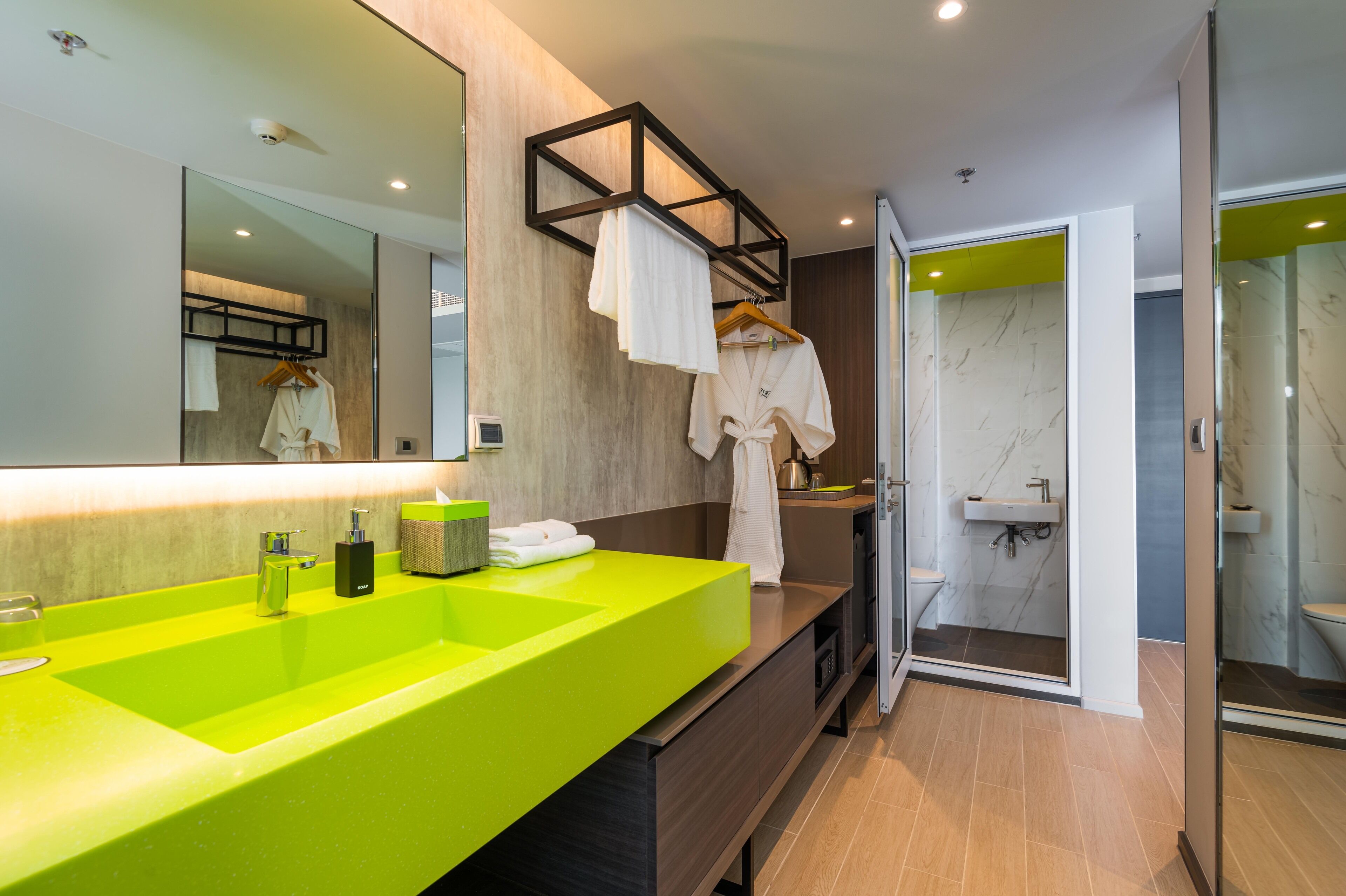 Eco-friendly toiletries, hair dryer, slippers, bidet