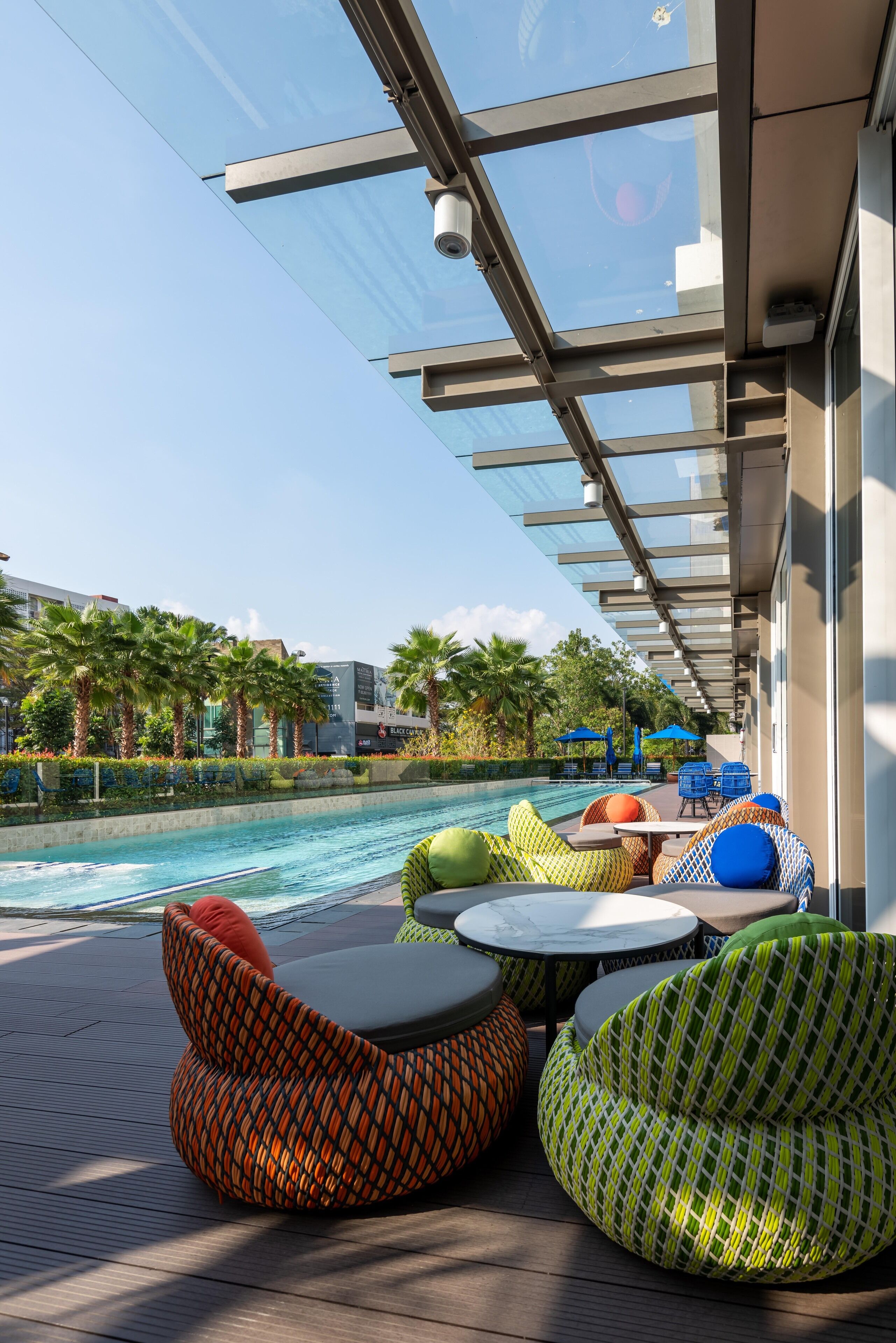 Outdoor pool, open 6:00 AM to 10:00 PM, pool umbrellas, sun loungers