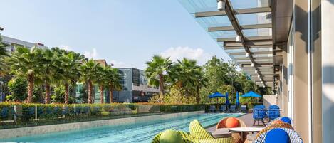 Outdoor pool, open 6:00 AM to 10:00 PM, pool umbrellas, sun loungers