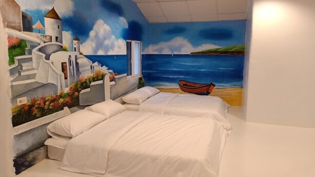 Apartment | Minibar, blackout drapes, WiFi (free), bed sheets - Colorful Cloudy Villa (Hengchun)