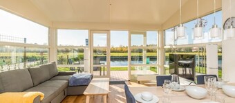 Design, clean-lined and atmospheric best describe this detached island home - completed in 2018! Fro