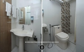Bathroom features a sink, toilet, and shower area with a tiled floor and walls.