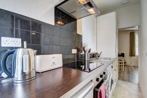 Fridge, microwave, oven, stovetop - Apartment Caerlaverock Road, Ground Floor Flat (Prestwick)