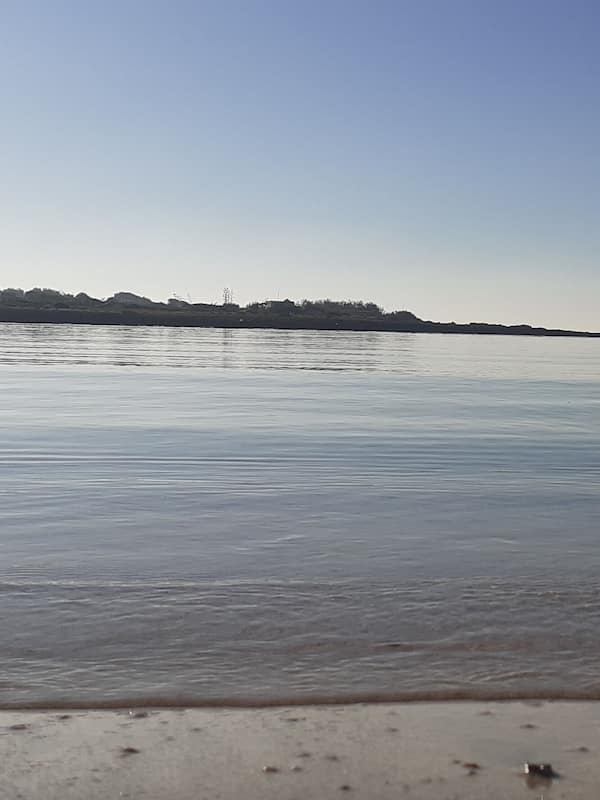 On the beach, white sand