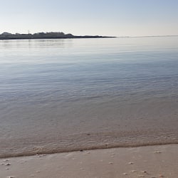 On the beach, white sand