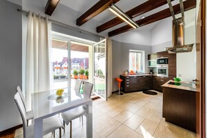 Penthouse | Living area | Flat-screen TV