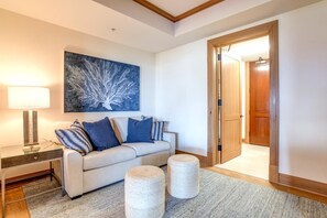  A cozy corner of the guest suite, where soft textures, ocean hues, and gentle light invite quiet moments of retreat   - The Resort at Kapalua Bay | Ocean View 3 BR | Car Incl. w/ 6+ Nights | MON-6401 by KBM (Lahaina)