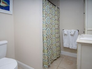 Combined shower/tub, towels, soap, toilet paper