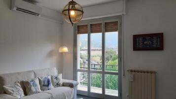 Apartment, 2 Bedrooms | Living area | Flat-screen TV