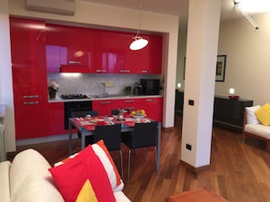 Appartamento, 1 camera da letto | Area soggiorno | TV