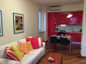 Apartment, 1 Bedroom | Living area | TV