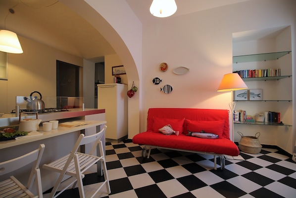 Apartment, 1 Bedroom | Living area | Flat-screen TV