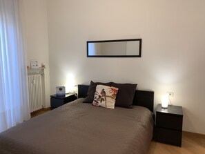 Apartamento, 2 quartos | 2 quartos, ferros/tábuas de passar roupa, Wi-Fi de cortesia
