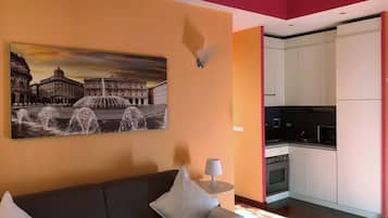 Apartment, 1 Bedroom | Living area | Flat-screen TV