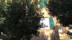 A building with green shutters and balconies. - House Nervi (Genoa)