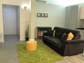 Lägenhet - 1 sovrum | Vardagsrum | Platt-tv