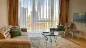 Royal Apartment | Living room | 43-inch LED TV with satellite channels, TV, Netflix - Royal Residence İstanbul (Istanbul)
