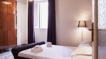 Apartment, 2 Bedrooms | 2 bedrooms, blackout drapes, iron/ironing board, free WiFi