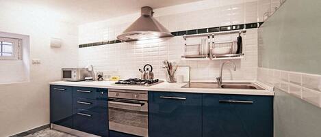 Apartament, 1 dormitori | Cuina privada | Frigorífic gran, microones, forn i placa de cuina