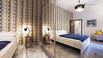 Apartment, 1 Bedroom | 1 bedroom, blackout drapes, iron/ironing board, free WiFi