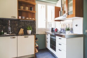 Appartement, 3 chambres | Cuisine privée | Grand réfrigérateur, four, plaque de cuisson, lave-vaisselle