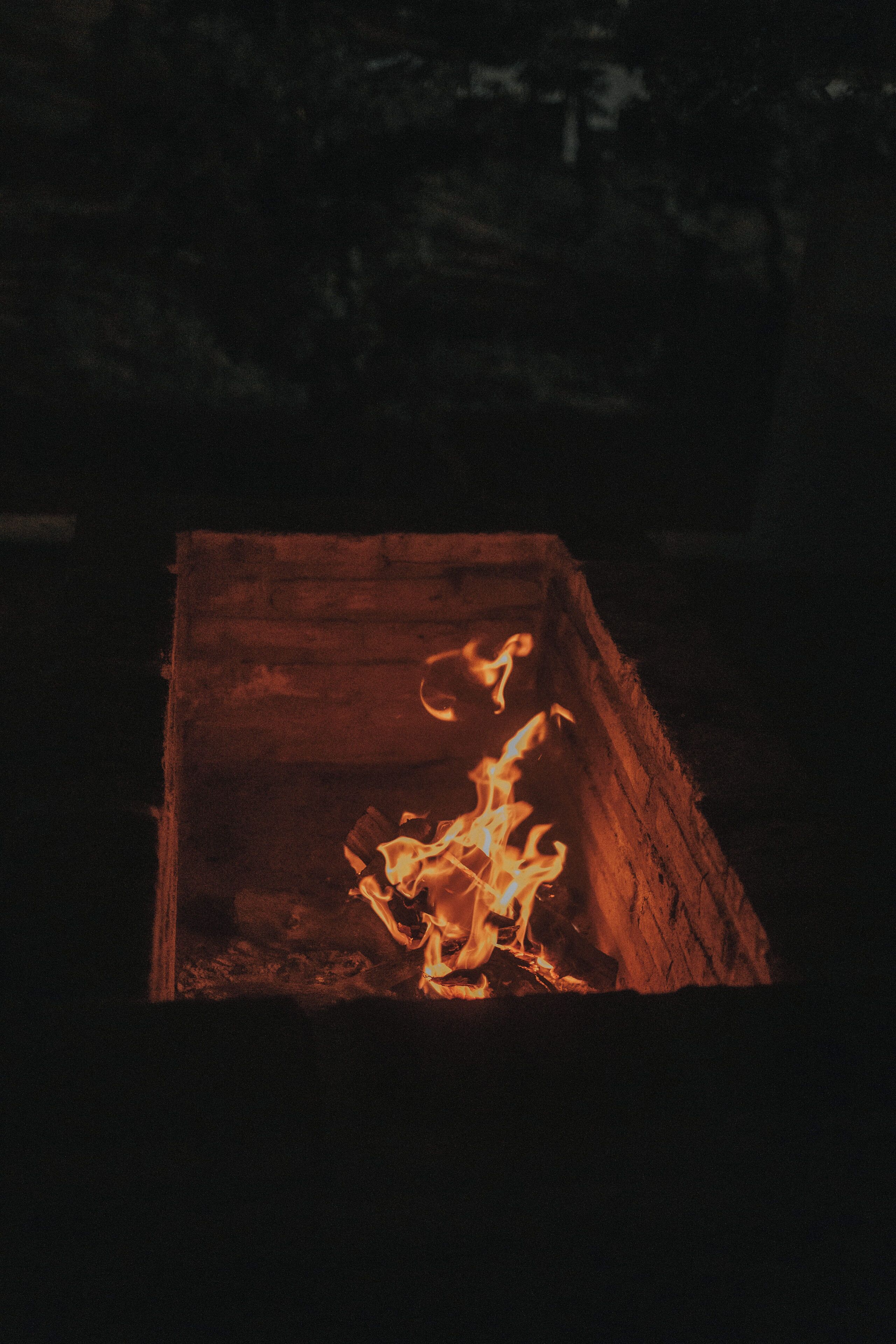 A wooden box with a fire inside.