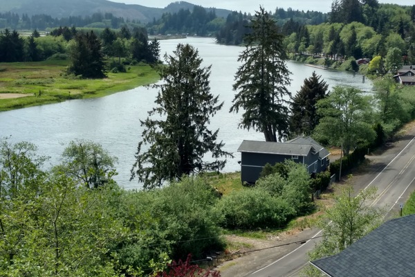 No neighbors, just the Nehalem River flowing toward the ocean.