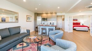 A modern apartment with a living room, kitchen, and bedroom. - 1 bedroom Penthouse at the Peaks Resort and Spa (Mountain Village)