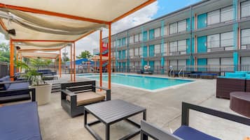 Outdoor pool, open 10:00 AM to 10:00 PM, pool cabanas (surcharge)