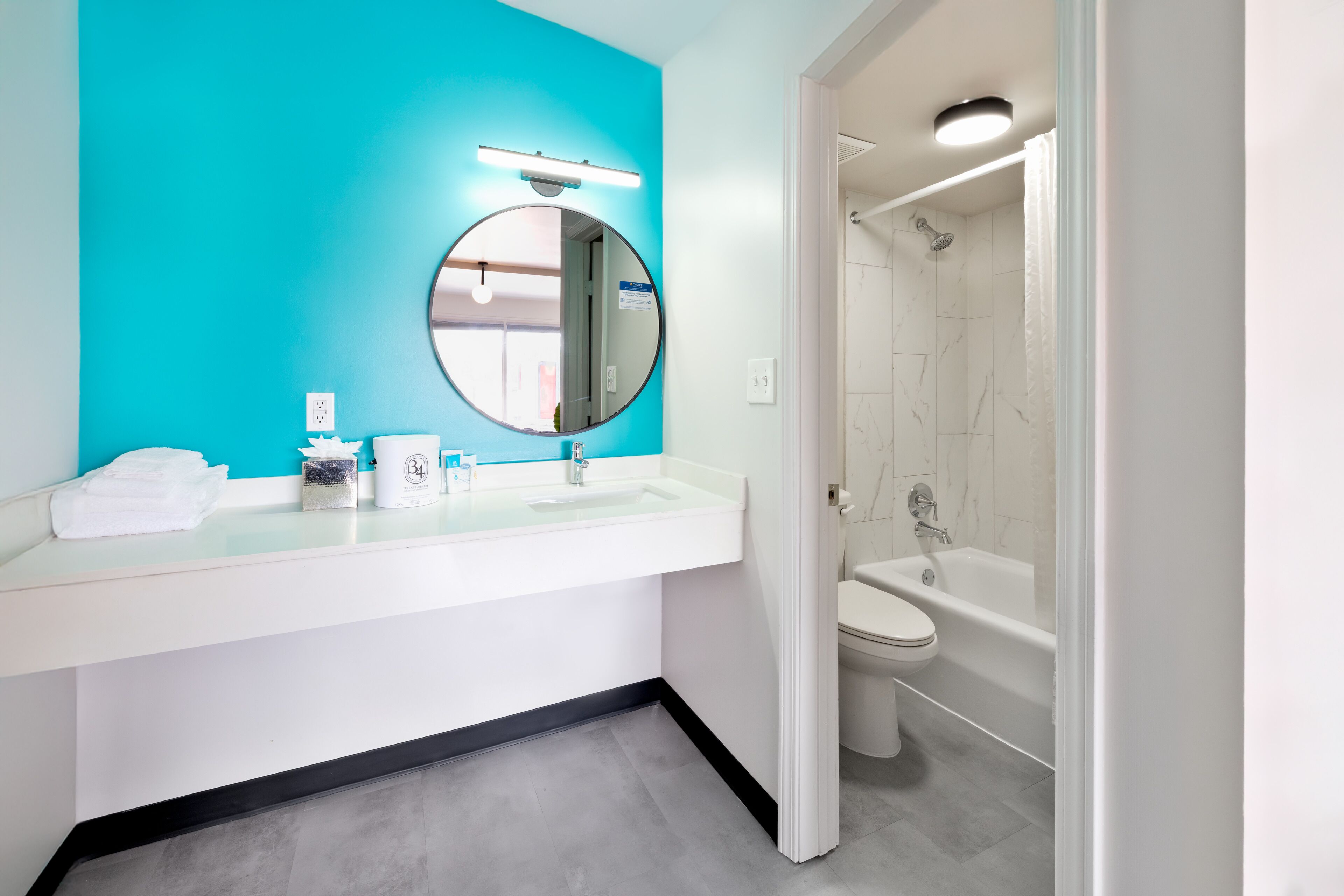 combined shower/bathtub, hair dryer, soap, shampoo