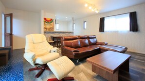 Private Vacation Home | Living area | Flat-screen TV, DVD player - Resort in Ishigaki (Ishigaki)