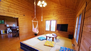 2 Bedroom Log House | Living area - The Subterraneans (Ishigaki)