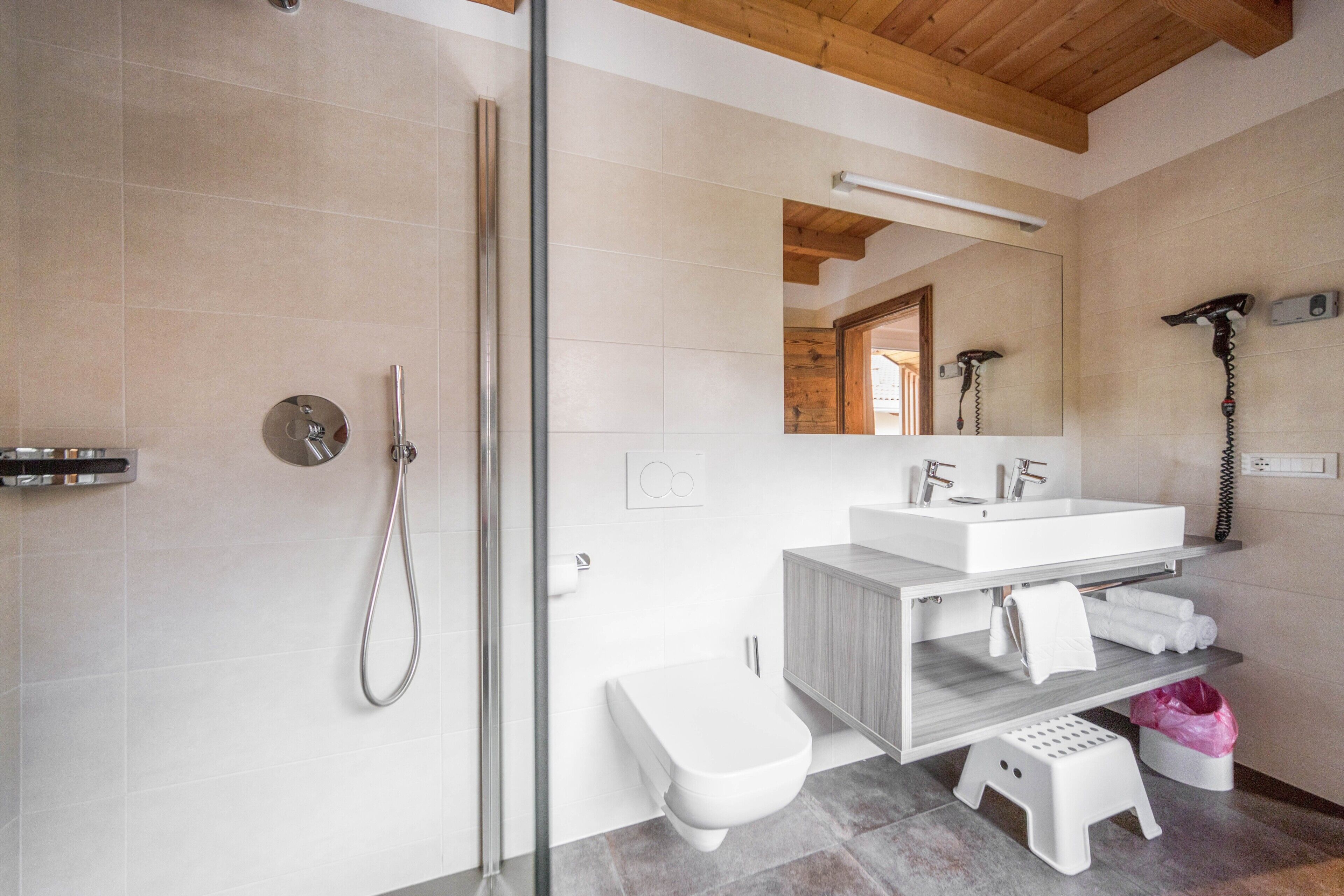 Bathtub, hair dryer, towels