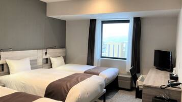 Triple Room | Desk, blackout drapes, iron/ironing board, free WiFi