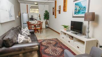 Superior Suite | Minibar, in-room safe, desk, iron/ironing board