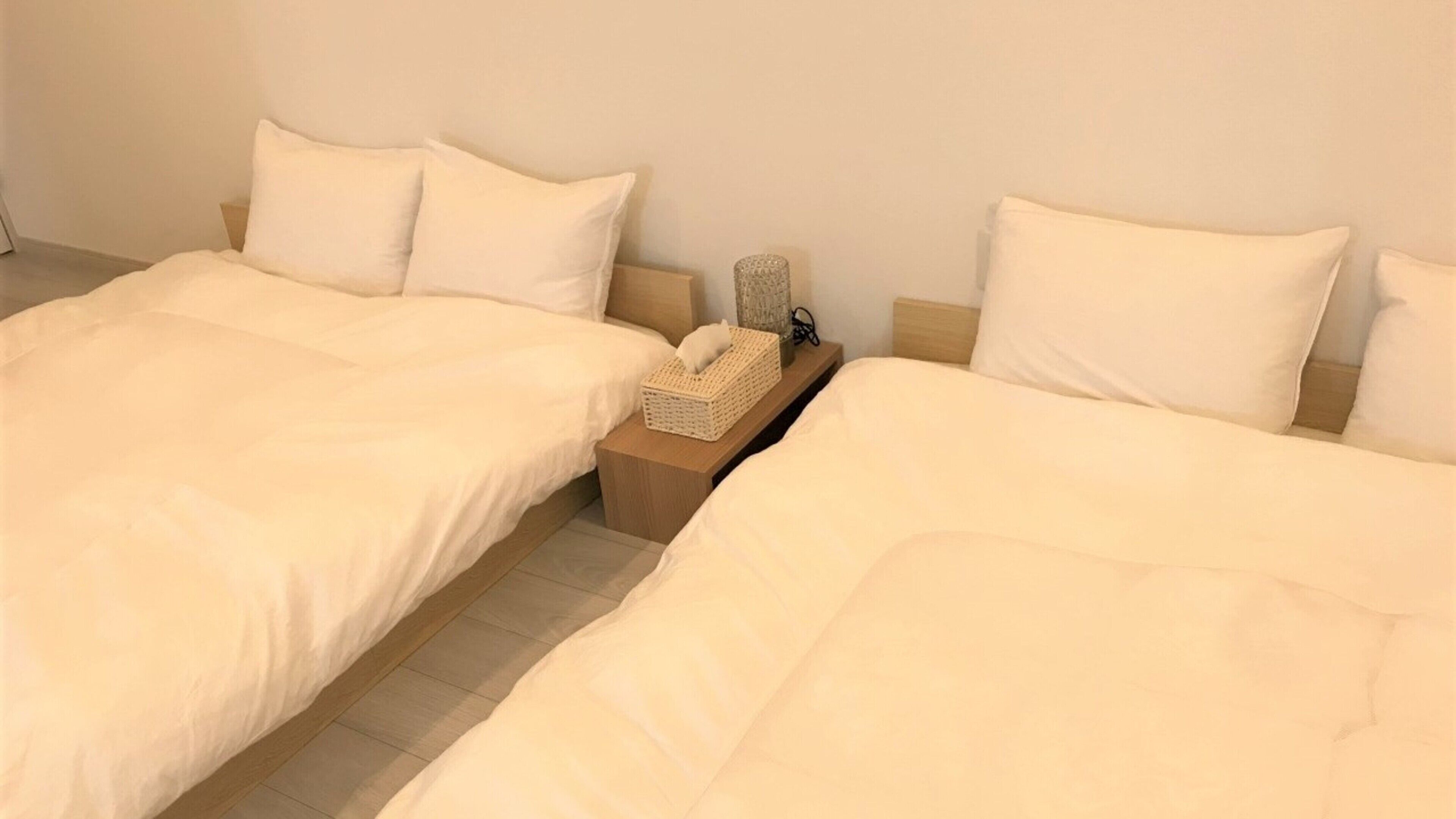 2 間睡房、羽絨被、手提電腦工作空間、遮光窗簾/窗簾