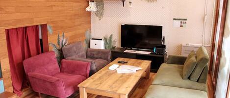 Basic Condo | Living area | 42-inch flat-screen TV with cable channels, TV, video-game console