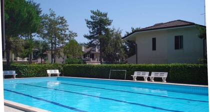 Holiday home with outdoor swimming pool and terrace