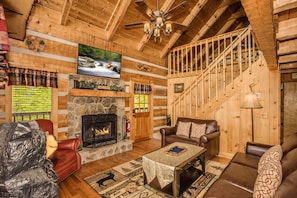 Flat-screen TV, fireplace, video games, DVD player