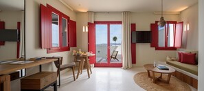 Deluxe Suite with Private Pool and Hot Tub | Living area | 36-inch Smart TV with cable channels, TV - Potnia Theron Suites (Santorini)