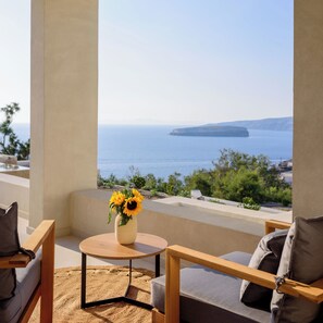 Senior Suite with Private Pool and Hot Tub | Living area | 36-inch Smart TV with cable channels, TV - Potnia Theron Suites (Santorini)