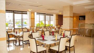 Breakfast, lunch, dinner served; local and international cuisine