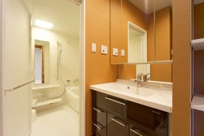Condo | Bathroom | Separate tub and shower, free toiletries, hair dryer, bidet - Longvacation Okinawa 103 (Onna)