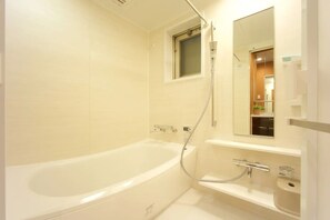 Condo | Bathroom | Separate tub and shower, free toiletries, hair dryer, towels - Longvacation Okinawa 209 (Onna)