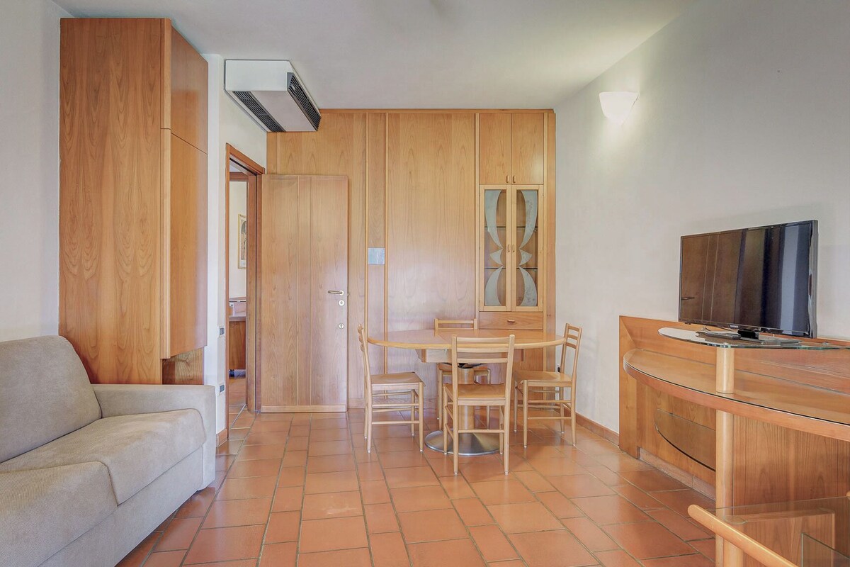 Apartment, 1 Bedroom | Living area | Flat-screen TV, table tennis