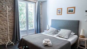 2 dormitorios, tabla de planchar con plancha, wifi gratis y ropa de cama